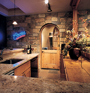 A modern application of the Dutch door, leading to the wine cellar/bar storage.