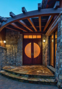 Modern entry doors with circle lite and transom