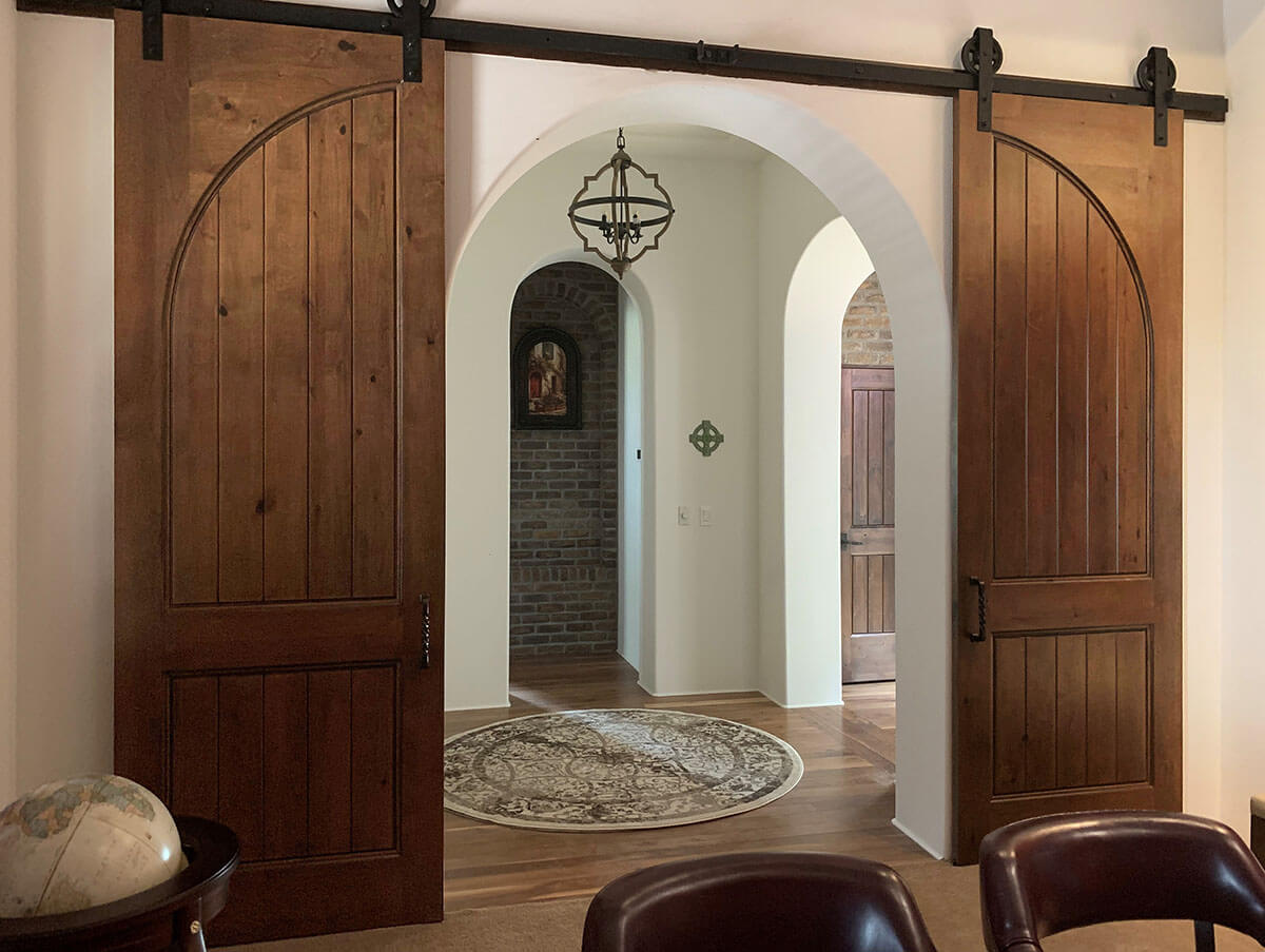 Barn Doors with Spanning True Arch Top Rail