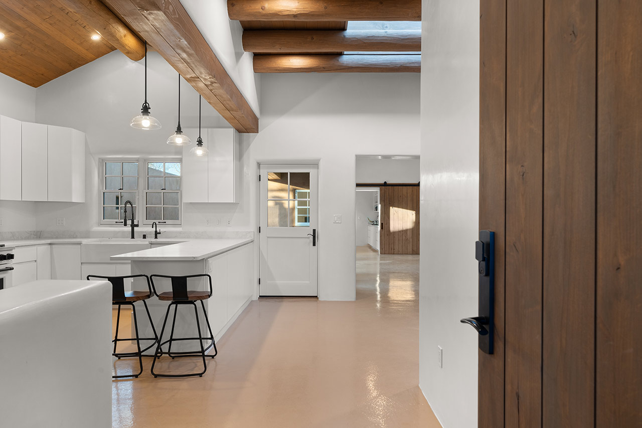 Contemporary Southwestern Flush Door in foreground - Sliding Door in background
